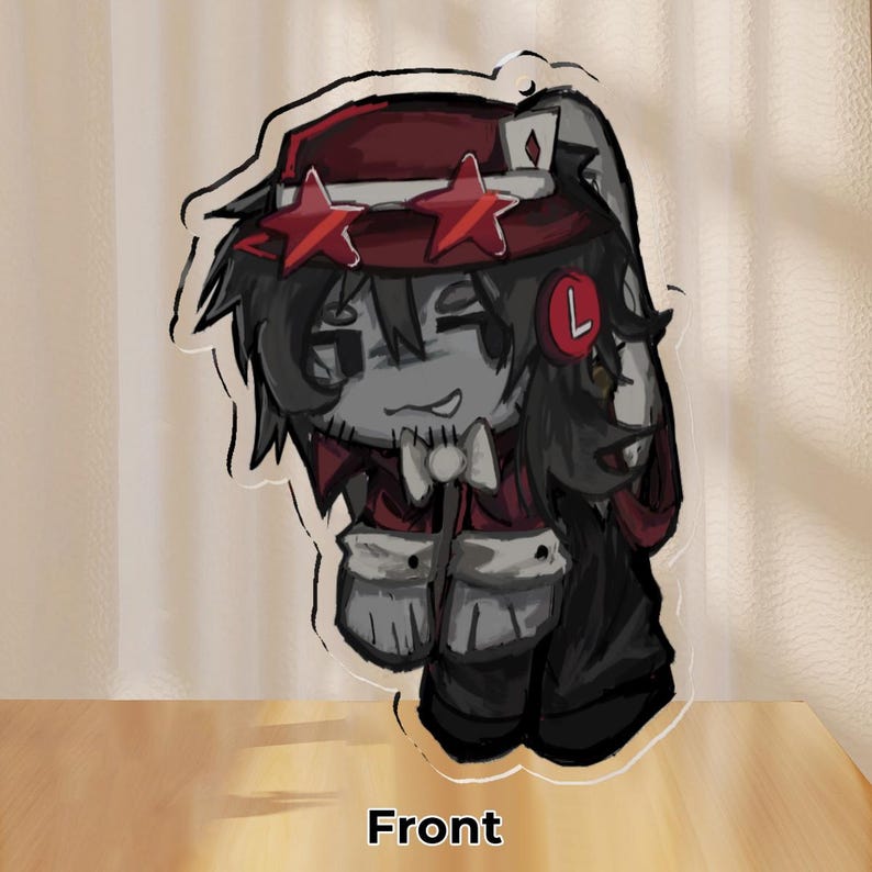 May include: A cartoon illustration of a character with a red hat adorned with star-shaped accents. The character has a gray complexion, a white bow tie, and is dressed in a red jacket with white trim. The word "Front" is printed at the bottom.