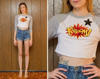 Kaboom Comic Book Action Sounds Heather Gray Black Star White Red Yellow Beaded Sequined Metallic 3/4 Sleeve Crop Baseball T-Shirt Top XS S