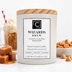 May include: A white candle in a cylindrical jar with a wooden lid. The label reads WIZARDS BREW, Caramel, Cream Soda, Butterscotch, Hand Crafted Candles, Infused with essential oils, ORGANIC, 8 OZ / 226 G, SOY WAX, Craft Me A Candle Co. LLC.
