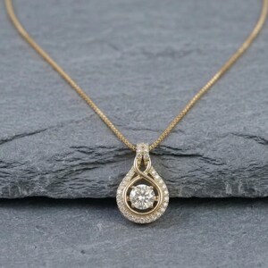 925 Sterling Silver Moissanite Gemstone & CZ Charming Flowing Infinity Loop Pendant