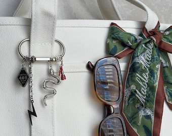 The “put the money in the bag & i stole the keys” Bag Charm