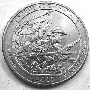 May include: A silver-coloured 2017 Indiana quarter coin featuring George Rogers Clark leading a group of men through water. The text reads GEORGE ROGERS CLARK, INDIANA, E PLURIBUS UNUM, and 2017. The design depicts figures in period clothing.