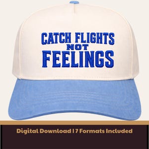 May include: A baseball cap in white and light blue, featuring the embroidered text "CATCH FLIGHTS NOT FEELINGS" in blue. The cap has a curved peak and a button on top. A fashionable headwear item.