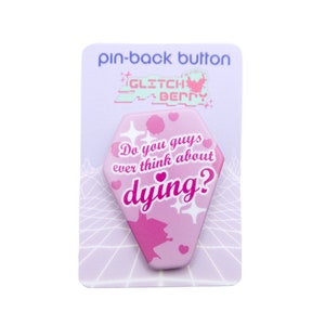 Thinkin&#39; About Dying Pin-Back Button | Spooky Pink Coffin-Shaped Button Badge