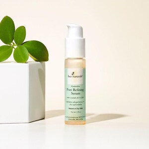 May include: A white bottle with a pump dispenser containing bee naturals Corrective Pore Refining Serum with Ceramides & Co Q10. The bottle is labeled for mature or dry skin and has a net weight of 1 fl oz.