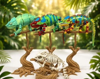May include: Three articulated chameleon figures in light green, blue-green with red, and multi-colored patterns, plus one white skeletal chameleon figure. Each figure is perched on a brown branch stand. The text 3DxColby LLC is visible.
