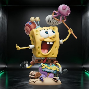 Op de afbeelding: Een levendig beeldje van SpongeBob SquarePants, met een wijd open mond en een opgewekte uitdrukking. Hij houdt een net vast met een roze kwal. Gary de slak zit op zijn hoofd. De basis heeft het logo van de show en een schatkist.