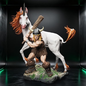 May include: A detailed figurine of a muscular warrior with a club, wearing a horned helmet and fur clothing, standing before a white unicorn with orange mane and tail. The base is a rocky terrain.