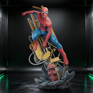 May include: A detailed Spider-Man figurine in a dynamic action pose, wearing a red and blue textured suit with a black spider emblem. The character is perched atop a yellow construction crane structure, a red fire hydrant, and gray rubble.