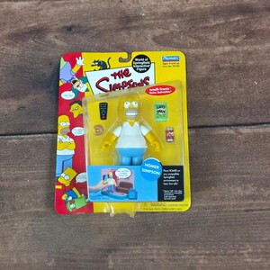 Figura de Homer Simpson de Playmates Los Simpson, nueva en caja, blanca y azul, con voz interactiva.