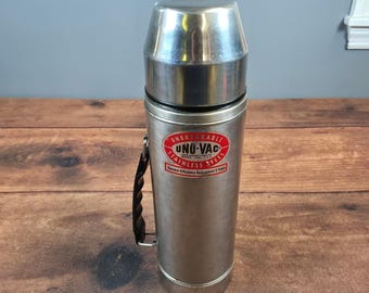 Botella térmica Uno-Vac para adultos, talla única, color plata, con asa de acero inoxidable.