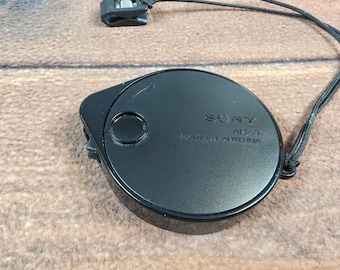 Antena compacta Sony AN-71 negra, excelente, retráctil, portátil, con clip para cable.