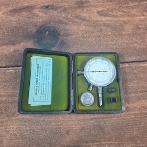 May include: A rustic wooden sign with the text "Welcome to our home" in white lettering. The sign features a distressed finish and a simple, inviting design, perfect for a front porch or entryway.