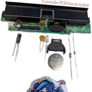 Könnte beinhalten: Ein Set aus drei Keramikbechern mit gesprenkelter, matter Oberfläche. Die Becher sind in Creme-, Hellgrau- und Dunkelgrautönen gehalten. Jeder Becher hat ein schlichtes, minimalistisches Design und einen abgerundeten Henkel.