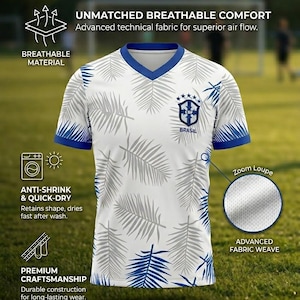 May include: White and blue soccer jersey with a palm leaf design. The jersey has a V-neck and blue trim. The text "BRASIL" is visible on the jersey. The jersey is made of breathable material and is anti-shrink and quick-dry.