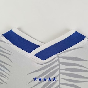 May include: A set of three ceramic mugs with a speckled, matte finish. The mugs are in shades of cream, light gray, and dark gray. Each mug has a simple, minimalist design, perfect for coffee or tea.