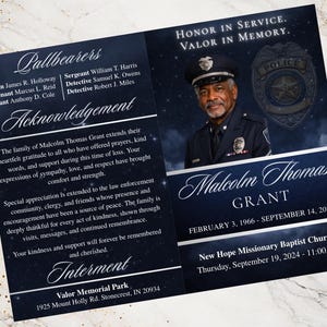May include: A memorial card with a portrait of Malcolm Thomas Grant in a police uniform. The card includes text honoring his service and memory, along with details of his life and the funeral service.