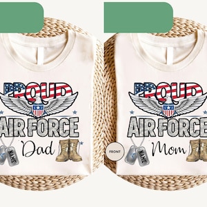 May include: Two white t-shirts with the text "PROUD AIR FORCE" and an eagle graphic. One shirt says "Dad" and the other says "Mom". Each shirt has dog tags and boots. The text "FRONT" is on the left side of each shirt.