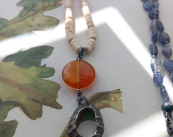 Long necklace with semiprecious stones and shell pendant