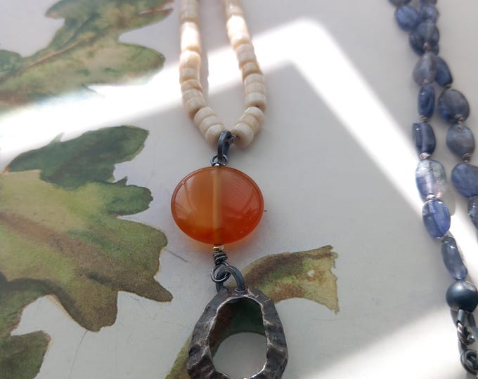 Long necklace with semiprecious stones and shell pendant