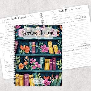 May include: A spiral-bound reading journal with a dark teal bookshelf cover featuring colorful flowers and books. The cover displays the text Reading Journal and 2027. The interior pages are white with black lines and fields for book reviews.