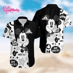 May include: Black and white button-down shirt featuring Mickey Mouse. The shirt has a split design with Mickey on the front and back, along with text and graphics. The Walt Disney logo is also visible.