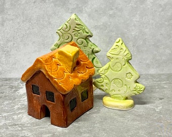 Log cabin House with two textured trees. Heart on back of cabin. Austin, Texas artist having fun in miniature.