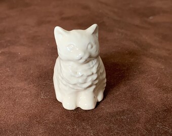 White Fluffy Cat. Fits nicely in a planter, terrarium, nook or beta tank. Too cute. Made from 1960's mold.