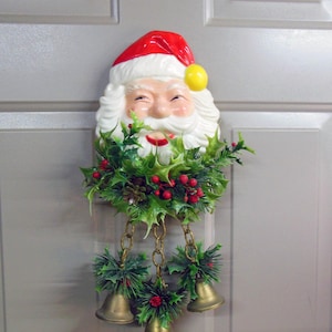 Vintage Santa Face with Greenery and Bells Wall Decor
