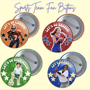 May include: Set of four sports team fan buttons. Each button features a glittery background with a photo of a child in a sports uniform. Text on the buttons reads "Let's Go" followed by a name. The buttons are round with a pin back.