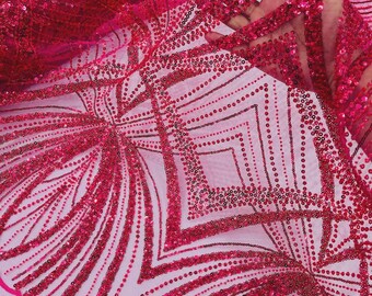 May include: A vibrant hot pink fabric featuring an intricate geometric pattern of sequins and beads. The design consists of repeating diamond and fan-like shapes created by dense rows of shimmering pink sequins on a sheer, lightweight mesh base.