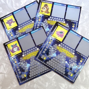 May include: Several game boards featuring Pokemon characters and the text "Tower of Terror." Each board has spaces for players, a score tracker, and images of Pokemon like Haunter, Nidoking, and Kangaskhan. The boards are primarily blue and gray.