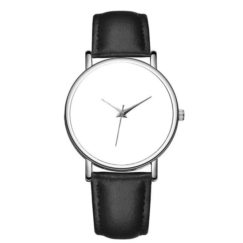 May include: A minimalist wristwatch with a white face and silver-colored casing. The watch has a black leather band. The hands are thin and black. The watch is a classic design.