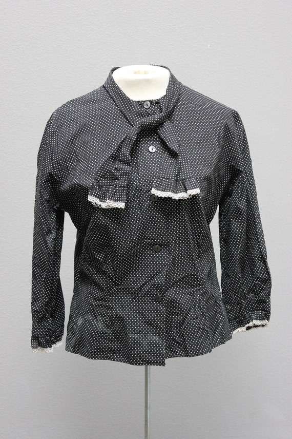 Translucent polka dot blouse