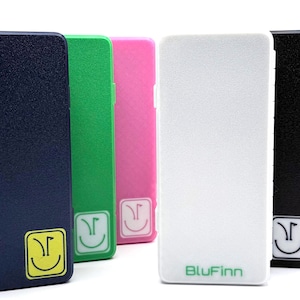 May include: A set of three ceramic mugs with a speckled, matte finish. The mugs are in shades of cream, light gray, and dark gray. Each mug has a simple, minimalist design, perfect for coffee or tea.