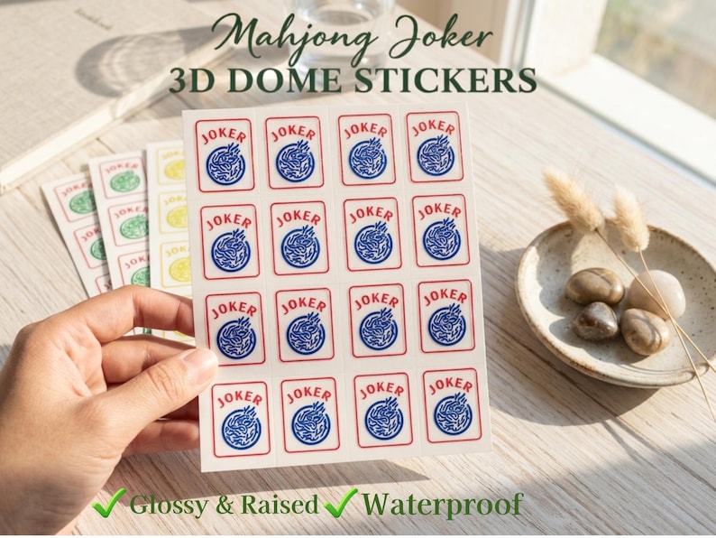 May include: Sheets of Mahjong Joker 3D dome stickers. Each sticker features a red border with the word "JOKER" and a blue and white design. The stickers are glossy, raised, and waterproof.