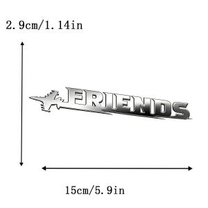May include: A silver metal emblem featuring the word "FRIENDS" in a stylized font, with a jet plane silhouette. The emblem is 15cm wide and 2.9cm high.