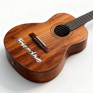 May include: Acoustic guitar with a natural wood finish. The guitar features a sound hole, strings, and a bridge. The word "Friends" is displayed in a silver script on the body of the guitar.
