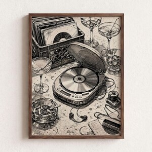 May include: A black and white ink-style illustration on canvas depicting a portable CD player with an open lid, a crate filled with vinyl records, two stemmed cocktail glasses, a glass ashtray containing cigarette butts, and wired earbuds.