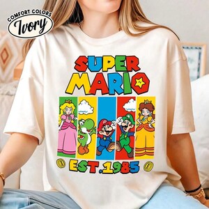 Cusotm Disneyland Mario Est 1985 Shirt, Mario Tee, Super Daddio Mommio Kiddo Shirt, Epic Universal Family Group Matching Tee 00 bild 3