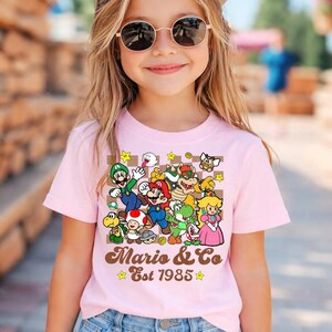 Disneyland Mario Est 1985 Shirt, Mario Galaxy Movie Shirt, Mario Luigi Princess Peach Shirt, Epic Universal Family Group Matching Tee 13 image 2