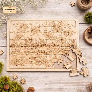 May include: Wooden jigsaw puzzle with a nature scene, featuring detailed illustrations of flowers, insects, and animals. Some pieces are separate, showing the puzzle's construction. The puzzle is made of light-colored wood.