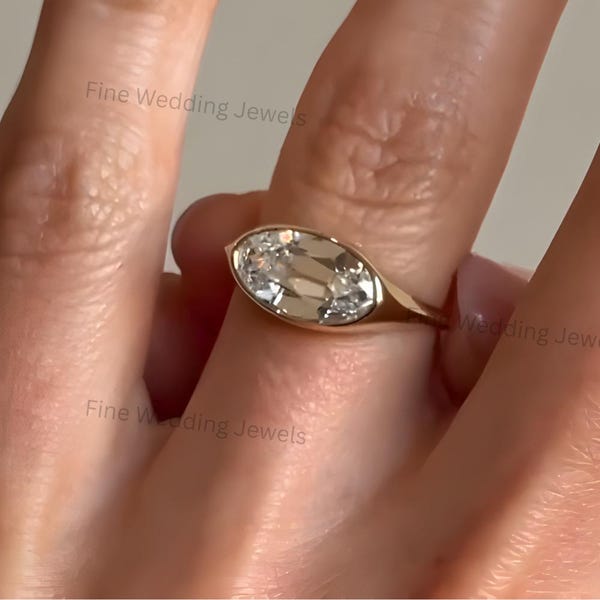 Oval Moissanite Signet Ring: 14K Gold East West Bezel Set