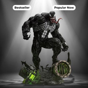 May include: A black Venom figurine with a white spider emblem on the chest, sharp teeth, and a long red tongue. The character stands on a base with green glowing canisters and a circular metal grate. Text labels read Bestseller and Popular Now.