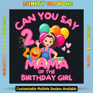 May include: A DTF transfer design featuring a cartoon girl and an orange monster character, colorful balloons, and the text CAN YOU SAY 2 MAMA OF THE BIRTHDAY GIRL. The graphic includes a large pink number 2, pink hearts, and a yellow school bus.