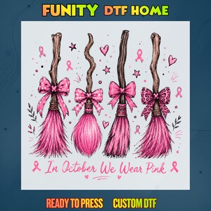May include: A graphic design featuring four brown wooden broomsticks with pink bristles, each adorned with a different pink bow. The image includes pink ribbon symbols, hearts, and stars, with the text In October We Wear Pink at the bottom.