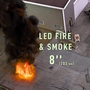 May include: A white ceramic mug with a black handle and the text "But First, Coffee" in a black, handwritten-style font. The mug is on a white surface.