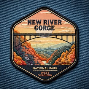 May include: A hexagonal embroidered patch featuring the New River Gorge bridge spanning a canyon with autumn-colored trees, a river, and mountains. The text reads NEW RIVER GORGE, NATIONAL PARK, and WEST VIRGINIA in dark blue against a sunset sky.