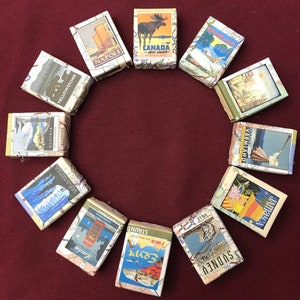 Twelve Map Mini Guest Soaps with vintage travel posters for wedding, travel theme party, retirement party, going away party and more