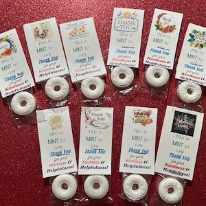 May include: Ten small white mints with colorful thank you cards. The cards have a floral design and say "This is MINT to say Thank You for your Kindness & Helpfulness!"